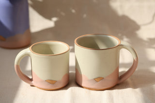 12 oz mug (left) next to the 18 oz mug (right) in Pale Bloom